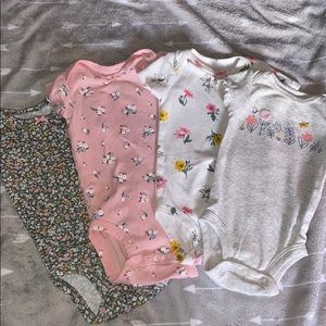Carter’s Lot of four floral onesies: 3m & nb